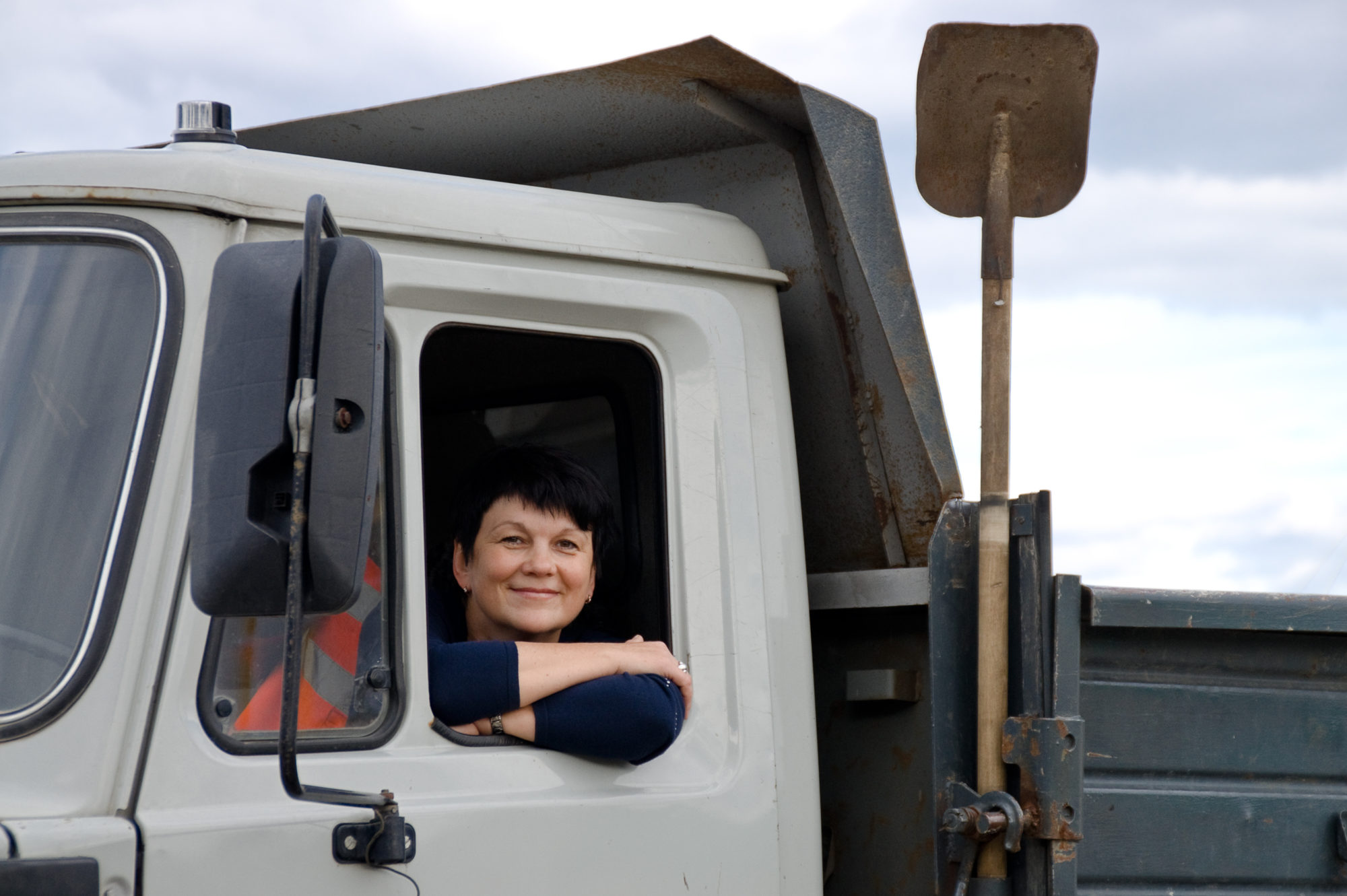 Woman Behind The Wheel Of A Truck
